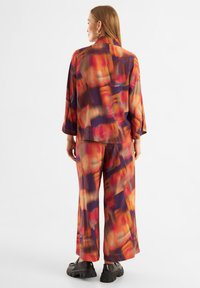 Jascha Stockholm PRINTED  - Hlače - solar sunrise