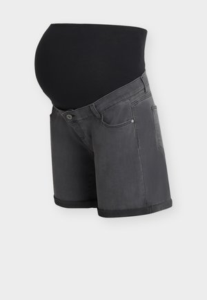 Pantaloni scurți negri pentru maternitate, cu talie elastică extinsă și tivuri rulante, prezentați pe un bust de manechin pe un fundal deschis.