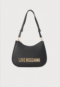 Black shoulder bag made of faux leather, featuring a curved design and gold lettering reading "LOVE MOSCHINO" on the front.
