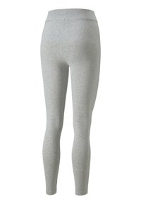 Grå leggings med en jämn textur, hög midja och tapered passform, tillverkade av en stretchig bomullsblandning. Inga synliga mönster eller detaljer.