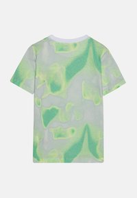 Calvin Klein Jeans EXCLUSIVE TIE DYE TOWELING UNISEX - Camiseta estampada - liquid yellow