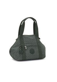 Borsa a tracolla verde scuro con motivo, doppi manici superiori, tasca frontale con cerniera e un piccolo portachiavi a forma di scimmia attaccato a un manico.