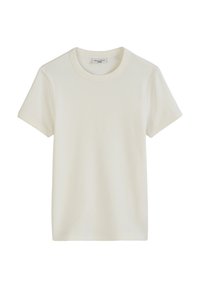 Krämfärgad bomullströja med korta ärmar, ribbad textur och rund halsringning. Enkelt designad, utan mönster eller dekorationer.