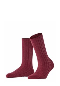 Calze a coste bordeaux di lunghezza intermedia, con punta rinforzata e un motivo a maglia testurizzata. Materiale morbido per il massimo comfort.