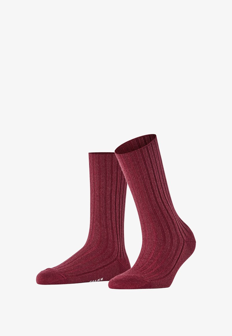 Maroon ribbed socks with a mid-calf length, featuring reinforced toes and a textured knit pattern. Soft material for comfort.