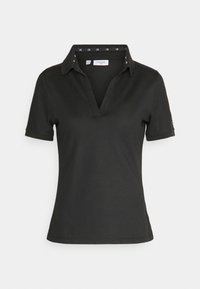 Polo de golf Calvin Klein noir à manches courtes avec col ouvert et logo CK à l'intérieur de l'encolure.