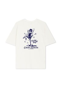 Krémové tričko s námořnickým grafickým motivem ženy v koktejlové sklenici s bublinkami a nápisem: "Páteční večerní přípitek. Drahá".