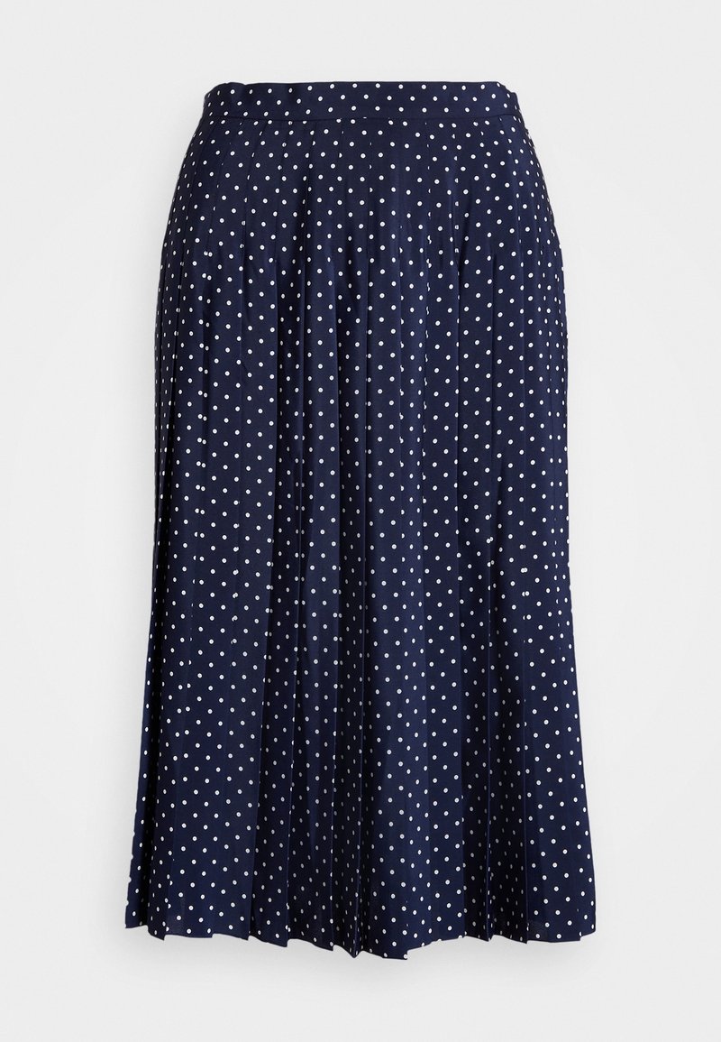 Jupe navy avec des pois blancs, design plissé, taille élastique et silhouette fluide. Fabriquée en tissu léger.
