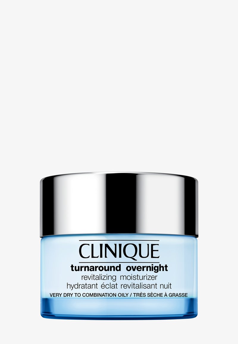 Clinique Turnaround Overnight -yövoidepurkki hopeisella kannella, merkintä hyvin kuivalle tai sekaihoiselle rasvaiselle iholle.