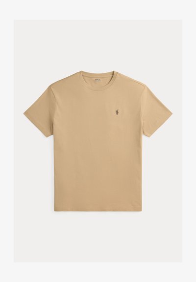 Μπεζ κοντομάνικο T-shirt με στρογγυλή λαιμόκοψη και μικρό κεντημένο λογότυπο Polo Ralph Lauren στο αριστερό στήθος.
