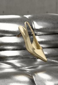 Niet geselecteerd, gold-coloured