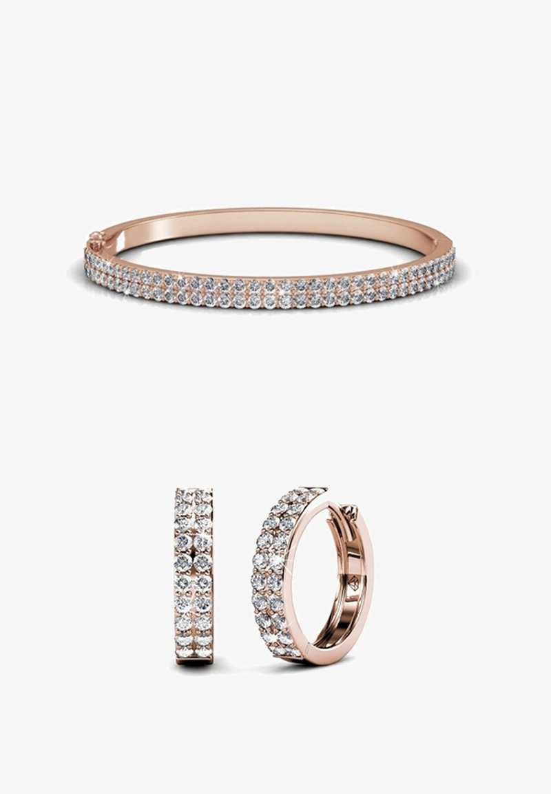 Roze gouden armband en oorringen, versierd met een rij ronde heldere kristallen, met een gladde metallic afwerking en cirkelvorm.