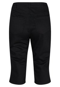 Vaqueros negros hasta la rodilla, hechos de una tela suave y elástica, con un diseño posterior limpio que incluye dos bolsillos rectangulares y detalles de costura sutiles.