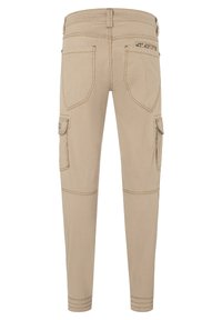 Beige Cargo-Hosen mit schmaler Passform, fünf Taschen und Steppnähte an den Knien. Mit verstellbarem Bund und Markenlabel auf der Rückseite.