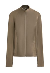 Tan zip-up jacka med långa ärmar, ribbad textur och två sidofickor. Har en hög krage och en figurnära design.