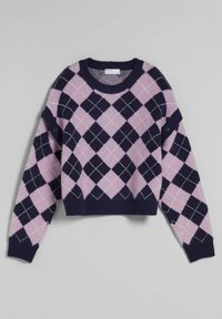 Lila och marinblå rutigt mönster, kortärmad tröja med rund hals, texturerad tyg och knappdetalj på ärmen.
