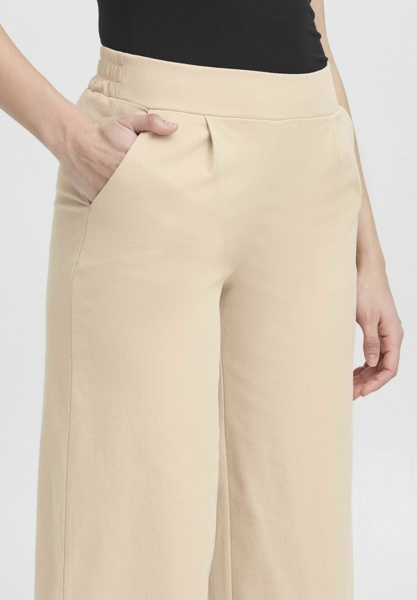 IHKATE - Flared Jeans - doeskin3