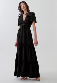 TUSSAH AUORA - Maxi dress - black