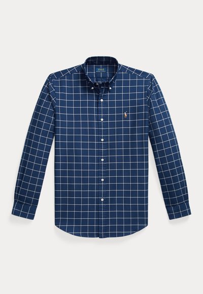 Navy blue button-up shirt made of cotton, featuring a white grid pattern, long sleeves, a button-down collar, and a small embroidered logo.