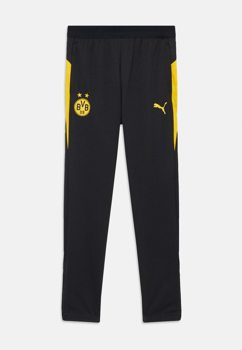 Schwarze Sporthosen mit gelben Akzenten, die ein Logo an der Vorderseite und seitliche Streifen haben. Hergestellt aus einem leichten, atmungsaktiven Stoff.