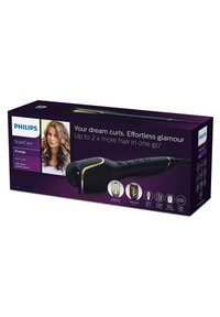 Die Verpackung des Philips StyleCare Prestige Auto Curler hat einen schwarzen Korpus mit goldenen Akzenten und zeigt Funktionen und Vorteile auf einem lila Hintergrund.