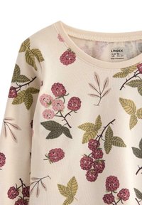 Kermakauhan pitkähihais тұс өкше, дөңгелек мойынмен, қызғылт, жасыл және қара қызыл түстерде жидек және жапырақ өрнегімен.