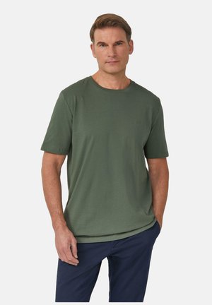 T-shirt olive à manches courtes avec col ras du cou, fabriqué en tissu doux, présentant un logo discret sur la poitrine et une coupe décontractée.