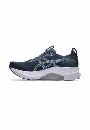 Marineblaue Laufschuhe mit strukturiertem Obermaterial, hellblauen Akzenten und einer weißen Zwischensohle, die einen grauen Bereich mit der Beschriftung "4D Guidance System" aufweist.