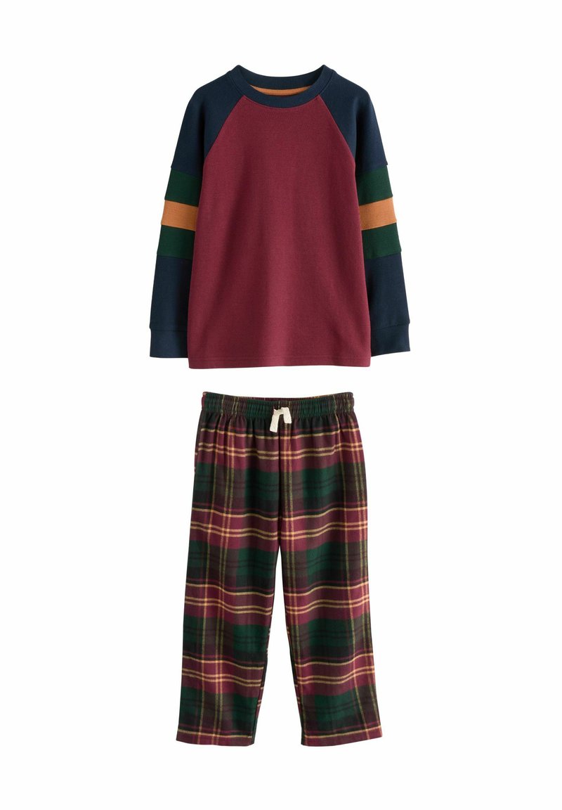 Red sweatshirt with navy, green, and orange striped sleeves; paired with green and burgundy plaid pajama pants with an elastic waistband.