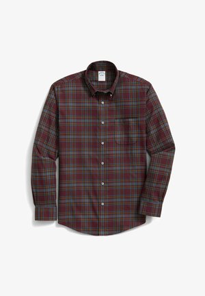 Karo košile s vínově červeným základem a modrými a zelenými pruhy, s knoflíky a límcem, jednou náprsní kapsou a dlouhými rukávy.