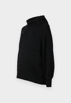 Zwarte coltrui met een relaxed fit, ribbelstructuur en ballonmouwen. Gemaakt van zachte stof met een zoom die op de taille valt.