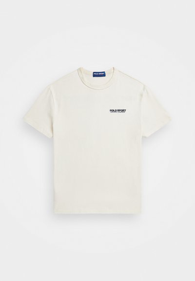 Cream cotton T-shirt with a crew neckline, short sleeves, and a small navy logo on the left chest side. Smooth texture, casual design.