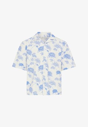 Chemise blanche à manches courtes avec des boutons, motif floral bleu et col décontracté.
