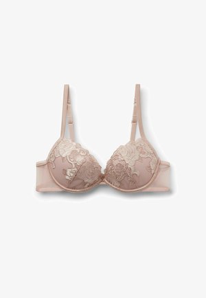 Soutien-gorge avec armatures en beige doux, recouvert de dentelle florale. Coupes rembourrées, bretelles ajustables et bandeau lisse au dos. Détail de motif floral texturé.