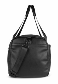 Sac en cuir noir avec une surface texturée, doté de sangles en tissu réglables et d'une fermeture éclair sur le dessus. Design minimaliste, forme rectangulaire.