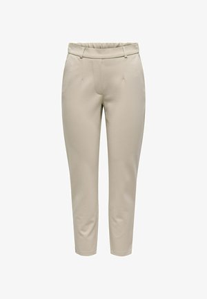 Beige tapered bikses, kas izgatavotas no gludas, elastīgas auduma. Funkcijas plakana josta un divas priekšējās kabatas. Minimālisma dizains.