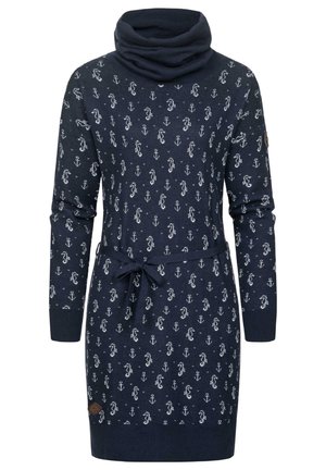 Navy knit dress with a cowl neck, featuring white seahorse and anchor patterns, long sleeves, and a drawstring belt at the waist.