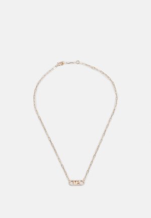 Gold-toned necklace with a textured chain and an oval pendant featuring a logo and small accent stones. Adjustable clasp for size.