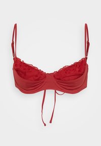 Reggiseno rosso con coppe arricciate, ferretto e spalline regolabili, chiusura a fiocco anteriore. Tessuto liscio con una leggera lucentezza.