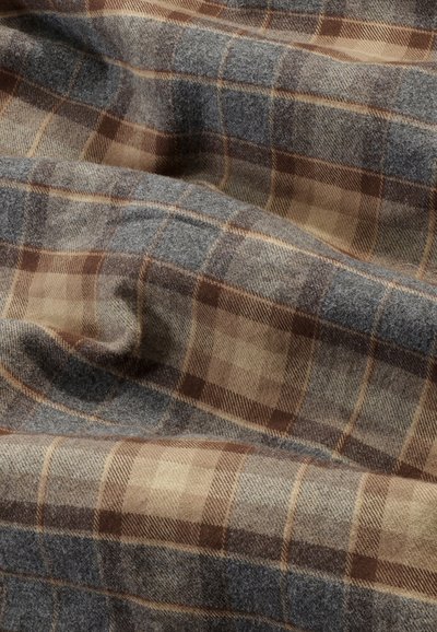 Brown, grey, and beige plaid fabric with a soft texture; features varying square sizes and a subtle, brushed finish.