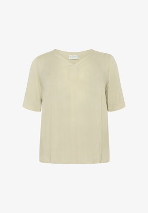 Blusa a maniche corte color beige chiaro con scollo a V e design dritto. Realizzata in un tessuto liscio e leggero.