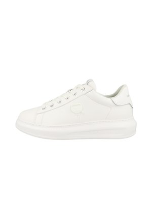 White low-top leather sneaker with round toe, lace-up closure, padded collar, and embossed logo on the side.