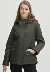 Dark green, water-resistant jacket with a zip-up front, adjustable hood, two side pockets, and a textured fabric finish.
