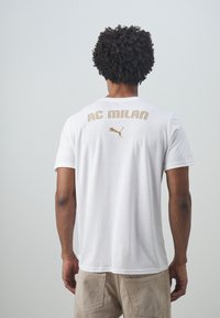Puma AC MILAN CASUALS TEE - Sports T-shirts - white/red