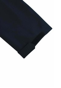 Black fabric sleeve with a smooth texture, featuring a Velcro closure at the cuff for adjustable fit. Edge is a clean, straight cut.