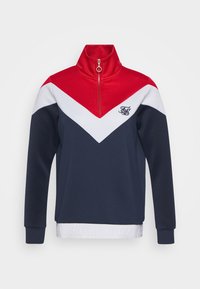 Felpa navy blue con zip a quarti caratterizzata da un design triangolare bloccato nei colori rosso, bianco e navy, e un elastico bianco con marchio. Materiale misto cotone.