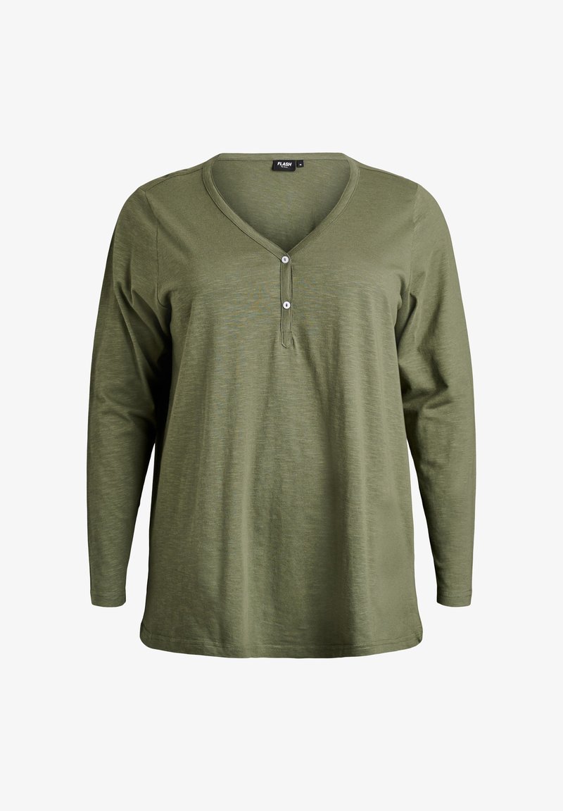 Dlhý rukáv, horčicovo zelený top z mäkkej látky. Má výstrih do V a zapínanie na tri gombíky, s voľným strihom pre pohodlie.