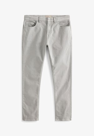 Jeans denim grigio chiaro a taglio slim con tasche frontali e posteriori, passanti per cintura e chiusura con bottone in vita.