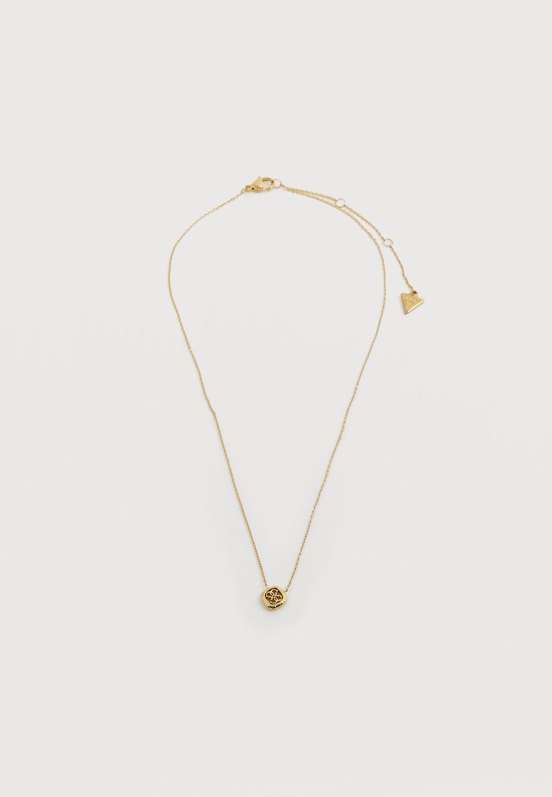 Λεπτή χρυσή αλυσίδα με ένα μικρό στρογγυλό μενταγιόν που διαθέτει περίπλοκο σχέδιο και ρυθμιζόμενο κούμπωμα με τριγωνικό διακοσμητικό.