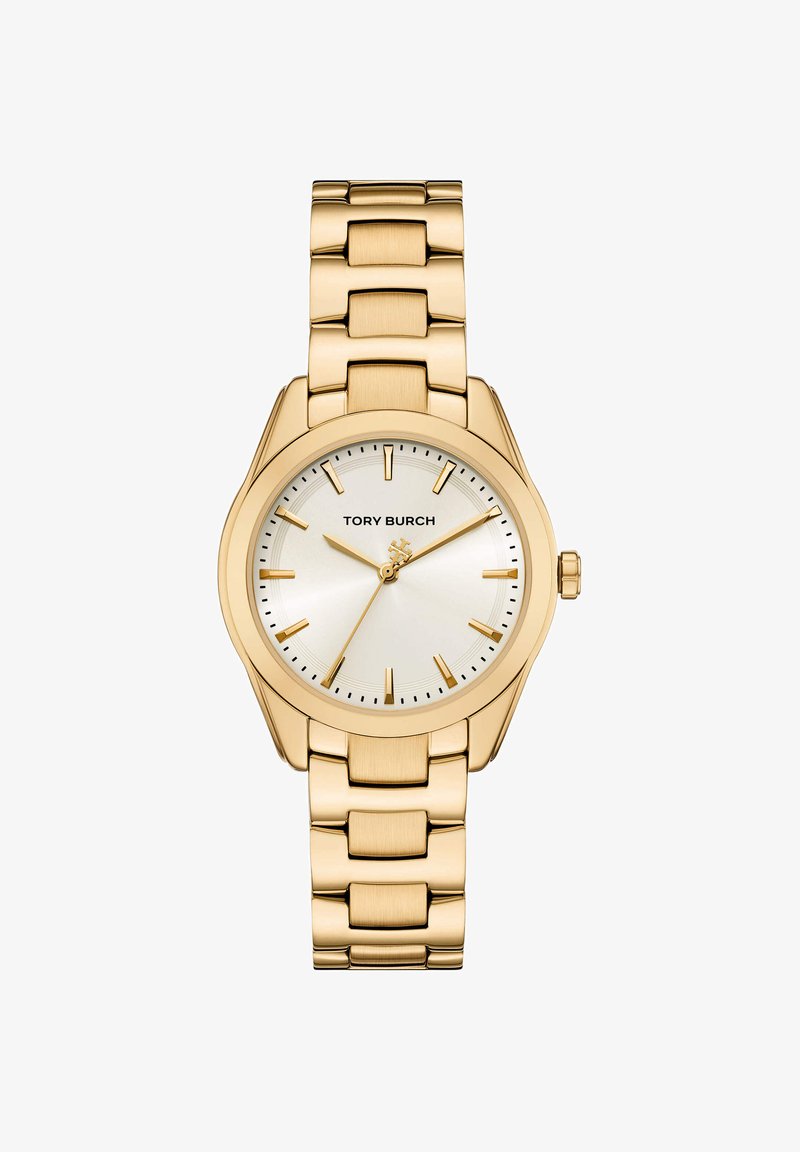 Montre-bracelet Tory Burch ton or avec bracelet lié, cadran blanc, index dorés et trois aiguilles indiquant 10:10:36.